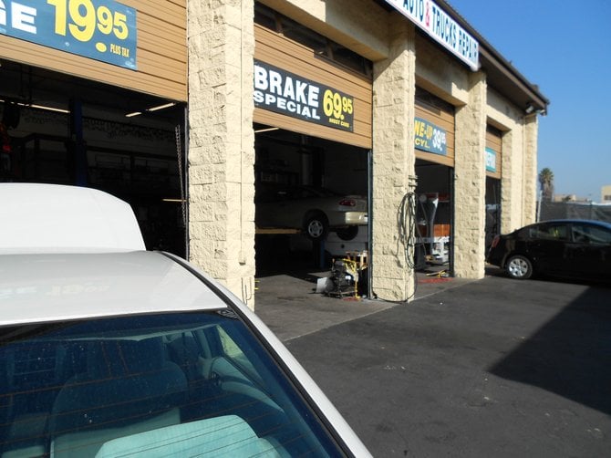 Car repair shops litter the streets behind the Sports Arena area.