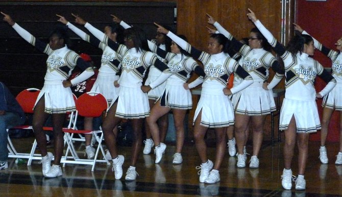 Morse cheerleaders hold a pose during a Tigers free throw attempt