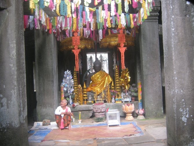 A Buddhist monk at the Preah Khan temple, Angkor Wat, Cambodia