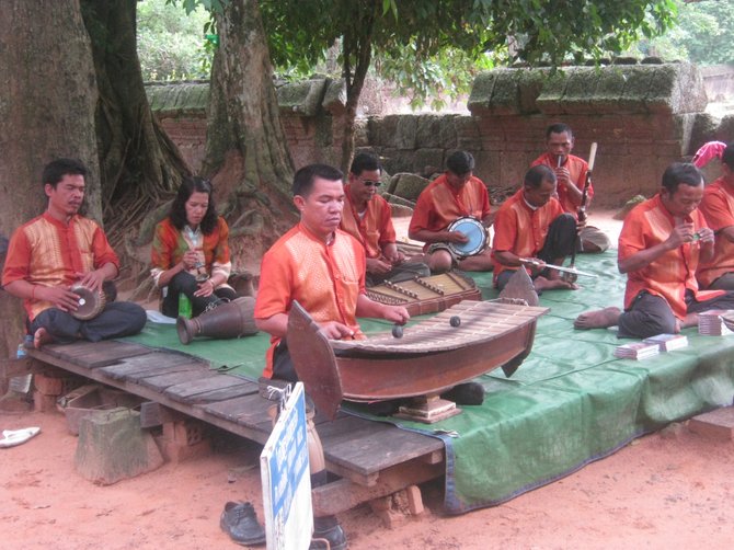 Musicians entertain visitors outside the Preah Khan temple in Siem Reap, Cambodia.