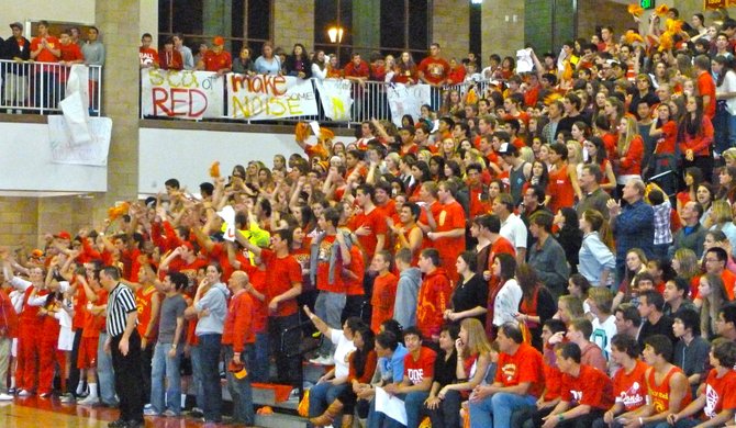 Cathedral Catholic's student section cheers on the Dons in the closing minute of their victory over rival St. Augustine