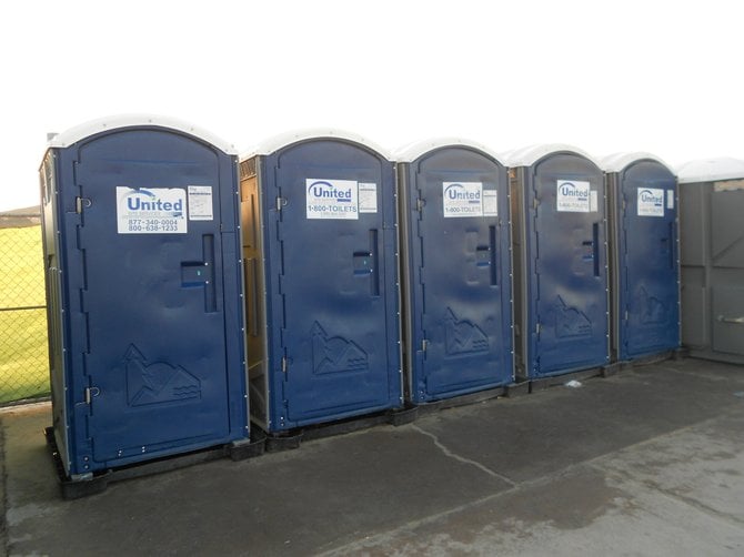 Row of portable toilets on Brighton Street near North OB.