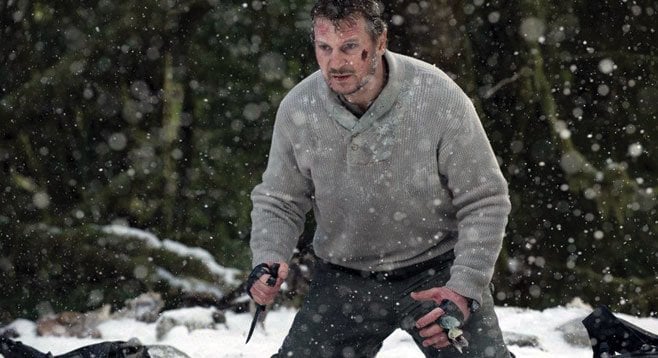 In The Grey, Liam Neeson plays a veteran, lone-wolf type who shoots wolves near Alaskan oil rigs.