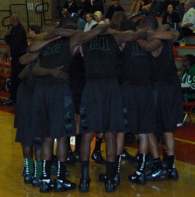 Lincoln huddles up before its game against Cathedral Catholic