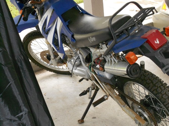 Abandoned & broken motorcycle with no registration or license plate left at Mariner's Cove Apt's.