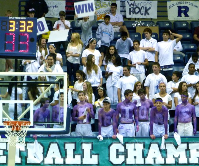 The Rock‘s student section set up shop behind the basket in the Division V Finals