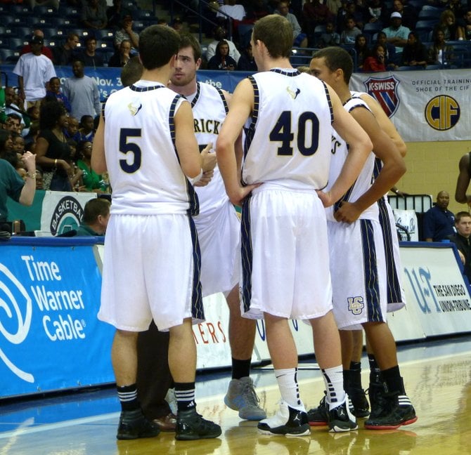 La Costa Canyon huddles up during a timeout
