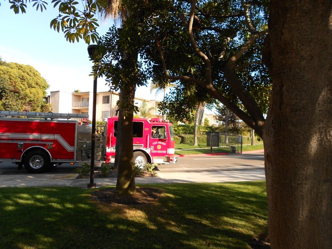 Firetruck exiting Mariner's Cove Apartments after another false emergency.
