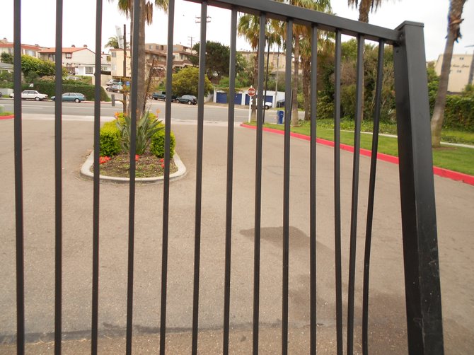 Broken "security gate" that was rammed by a resident at Mariner's Cove Apartments in Ocean Beach.