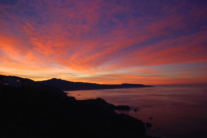 Predawn sunrise from atop the hill at Col. Puerto Escondido, just south of the La Bufadora Blowhole near Ensenada.