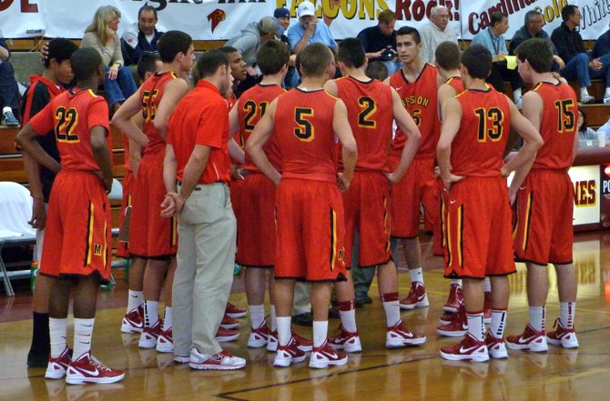 Mission Viejo huddles up during a timeout