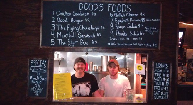 Guerrilla chefs Tommy Pockets and Justin Hulson man the Doods Foods window at Tin Can Ale House.
