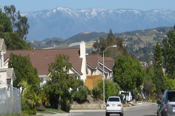 Snow on the mountains as seen from Oceanside neighborhood.