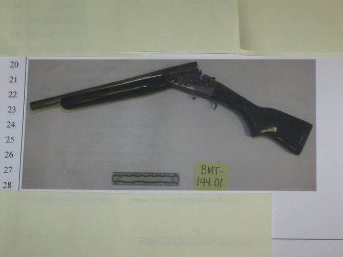Evidence photo of the sawed-off shotgun which police say was used to kill a Carlsbad man in his own garage April 1, 2011