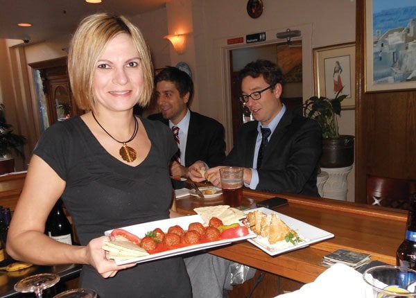 Rosalie with a plate of Greek meatballs