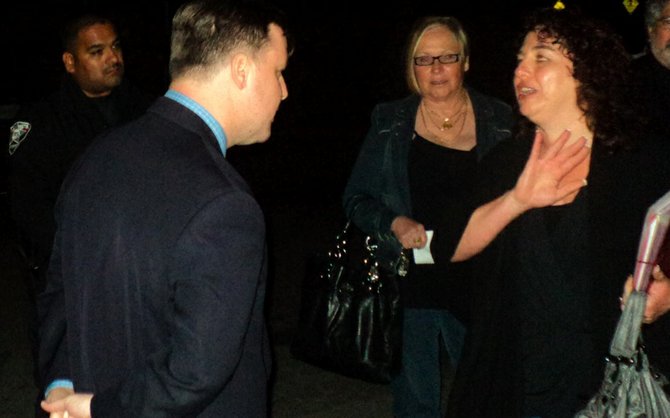 John McCann and Maty Adato (far right) converse after April 16 Sweetwater Union High School District board meeting.