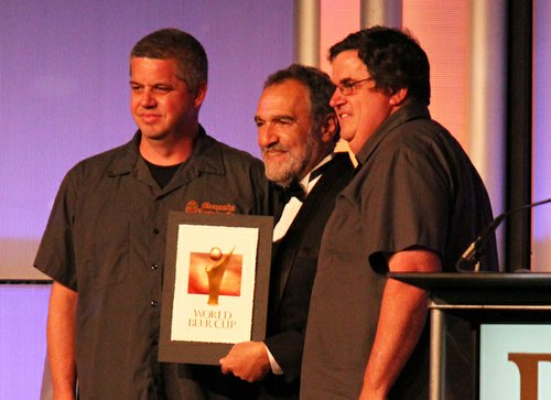 The owners of Santee's Manzanita Brewing accept their very first World Beer Cup award for the Experimental Beer, Where There's Smoke.