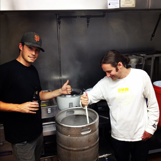 California Kebab and Beer Garden owner JC Hill (left) and brewer Cy Henley stirring things up.