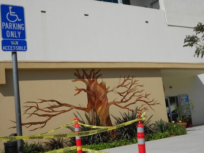 Liberty Station wall with tree art at Explorer Elementary School.