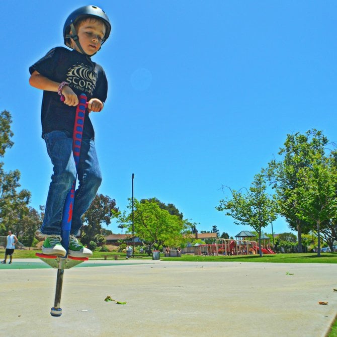 George Wilbur showing off his new pogo stick skills. Princess de la Reina Park, Del Cerro.