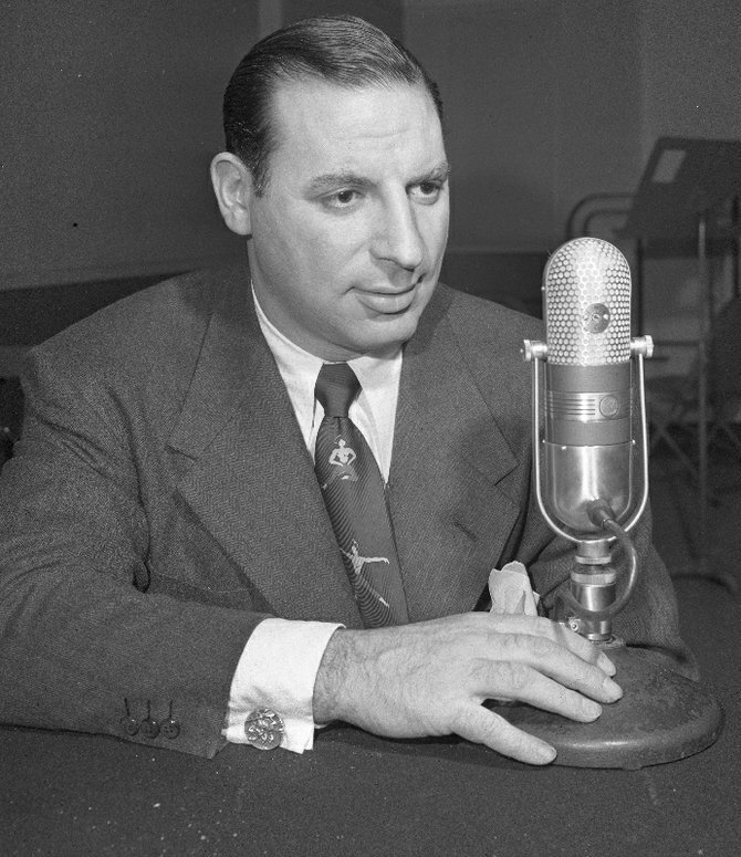 Nattily-tied Chicago Sun-Time Columnist, Irv Kupcinet, tongue-tied as usual.