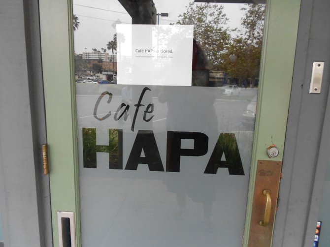 The risque Cafe Hapa now closed at Midway Towne Center.