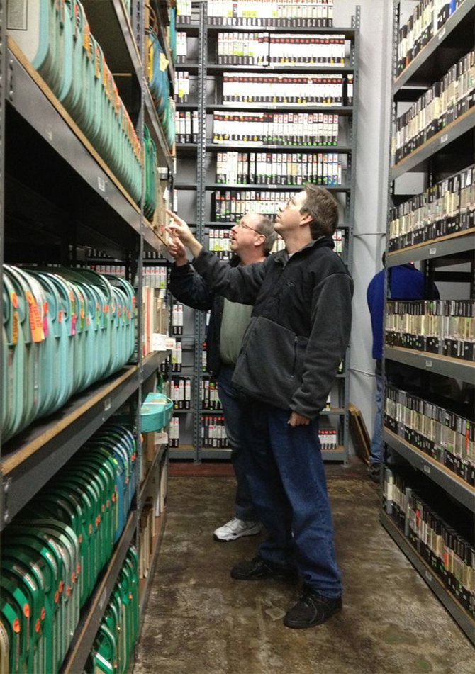 Reelin' President David Peck (right) and Vice President Phil Galloway (left) examine the storage facility holding over 20 years of tapes from the Merv Griffin Show, RITY's newest archive partner.