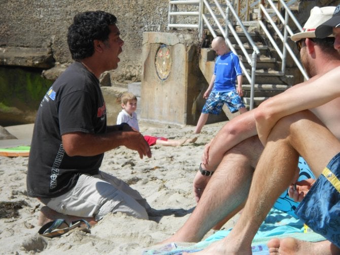 An agitated "Magic Mike" gets all up on a bunch of clueless tourists at Bermuda Beach in OB.