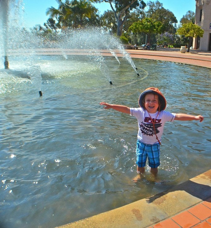 My son Fin, celebrating summer in the fountain at Balboa Park