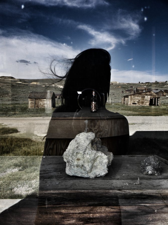 This photo was taken at the ghost town of Bodie located in California. I was trying to capture the inside of the old bar using my own reflection.
Title- I reflect.