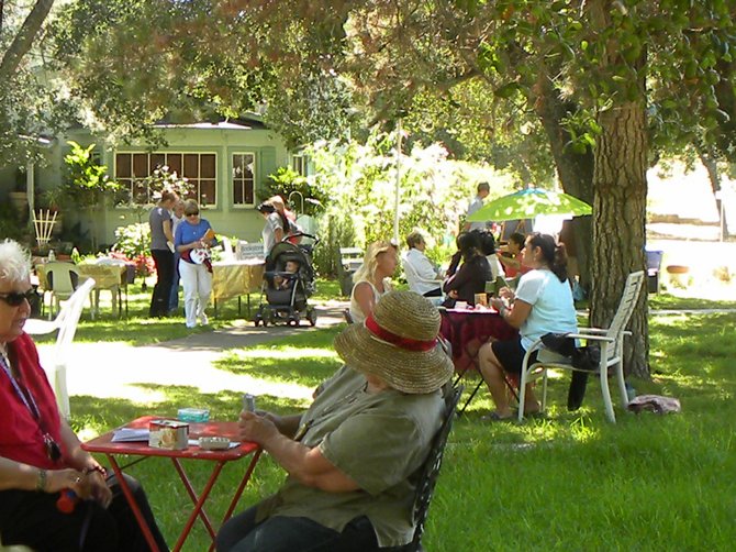 This is a photo of the psychic fair at Harmony Grove Spiritualist Association. The fair is held during the first week of every month and features readings by psychics and mediums for a twenty-dollar donation. There are also booths selling crystals, new age books and holistic healing stuff.
