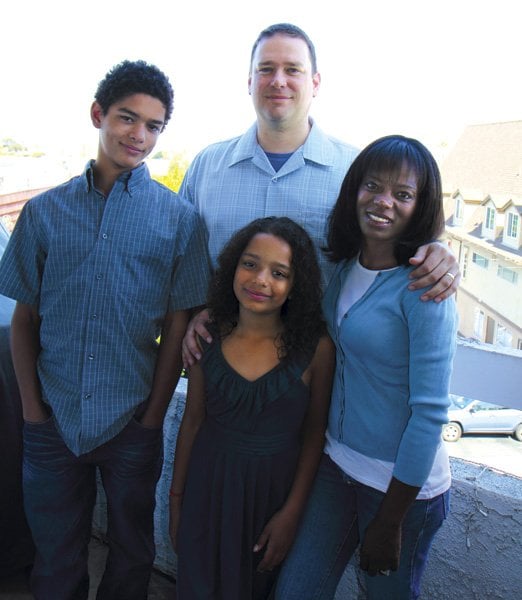 Delicia and husband Jerry with their son August and 
daughter Zoe on their balcony overlooking Mission Bay.