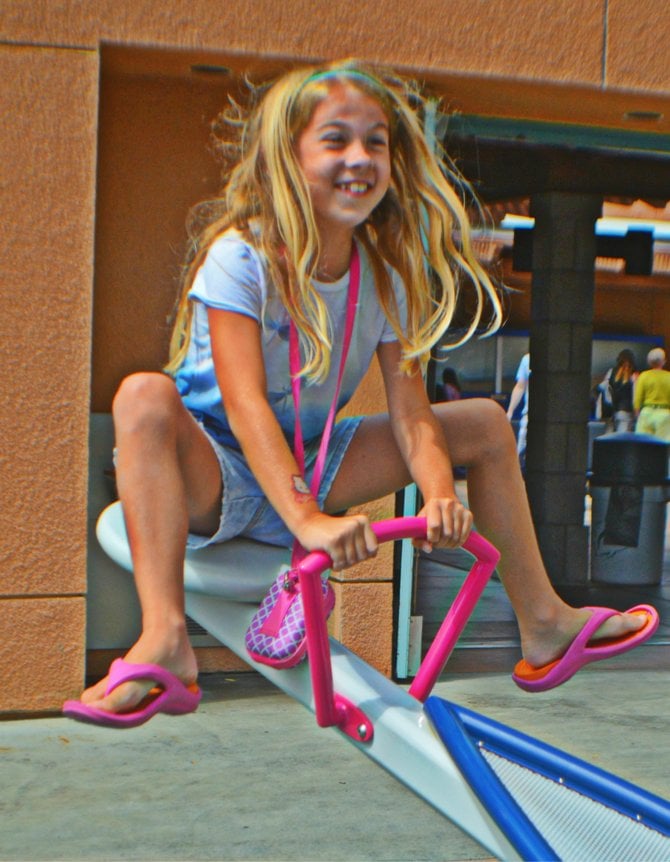 My daughter Aidan enjoying the oversized seesaw at the Birch Aquarium