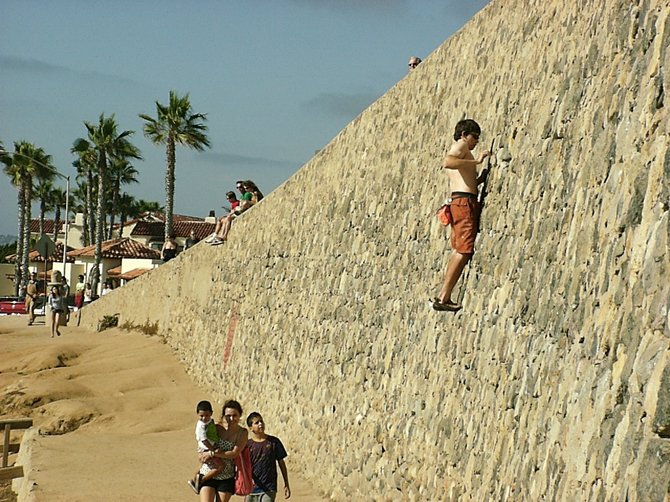Dude climbing a wall in La Jolla, July 28, 2012.