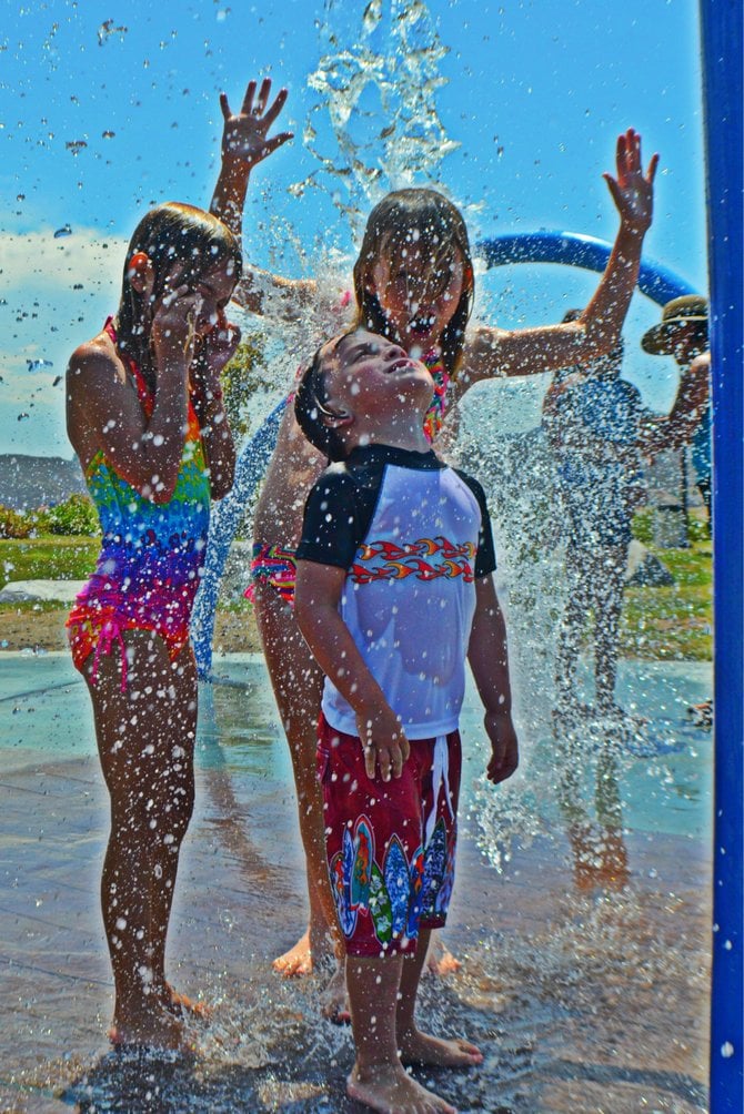 Kids eagerly waiting for the deluge at Hilton Head Spray Park in Rancho San Diego. 

Aug.2012