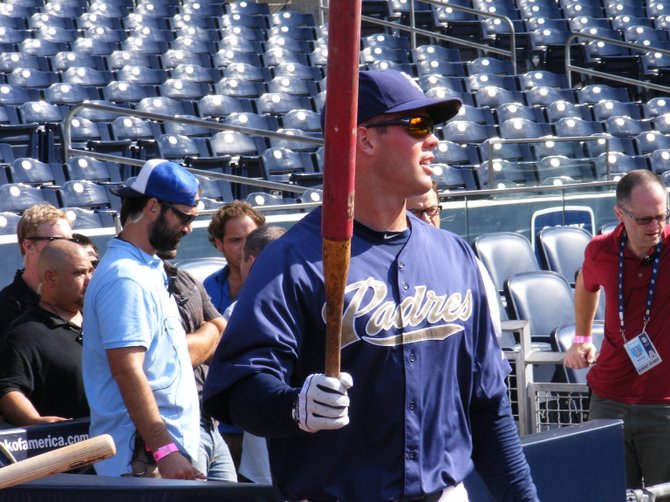 Padres pitcher Clayton Richard warms up for batting practice.