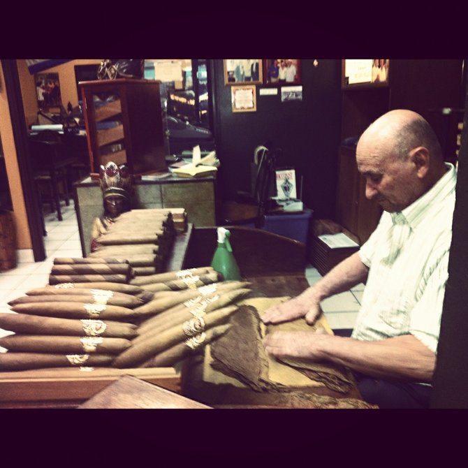 Freshly Rolled Cuban Cigar? This man offers autographs as well as a photo with him. Little Havana MIAMI.