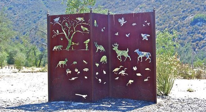 Fanciful fence welcomes visitors to the preserve