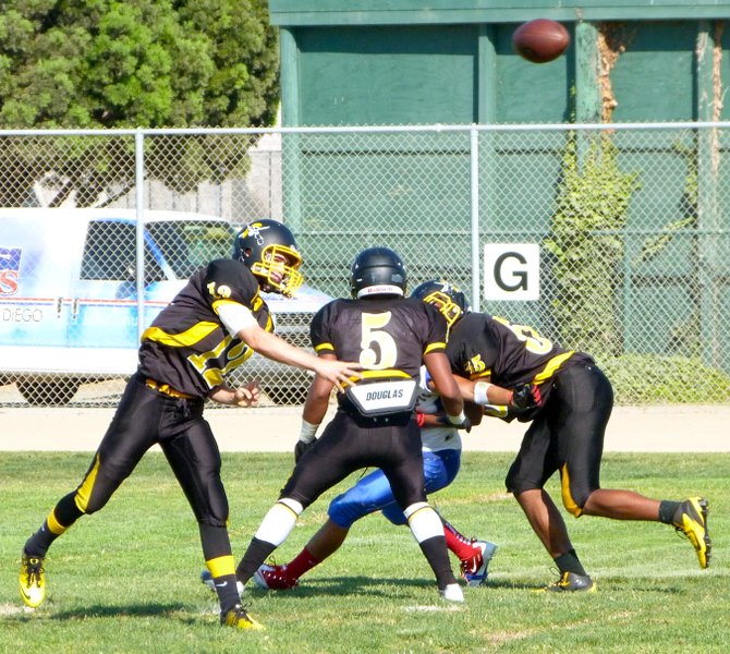 Mission Bay junior quarterback Nick Plum fires a pass downfield