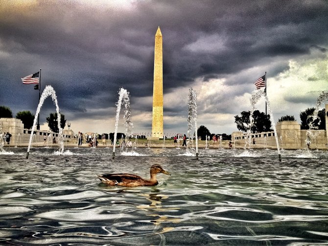 National World War II Memorial with the Washington Monument in the background - Washington, D.C. 2012 ©Sam Antonio