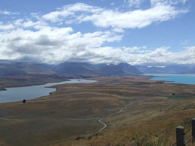 A Lake Tekapo panorama is a stark contrast in colors.