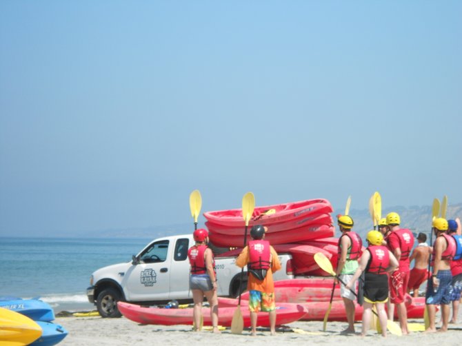 Kayak tour group getting orientation at La Jolla Shores beach.