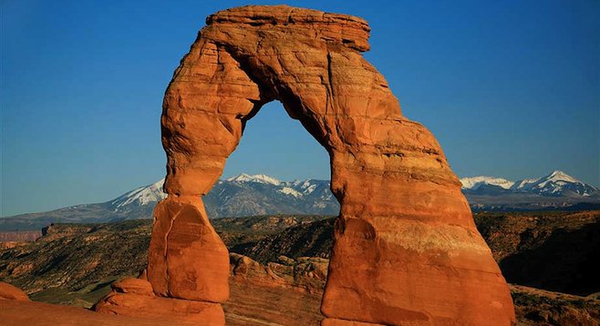 The widely recognized (and photographed) Delicate Arch frames Utah's La Sal Mountains 35 miles to the southeast. 