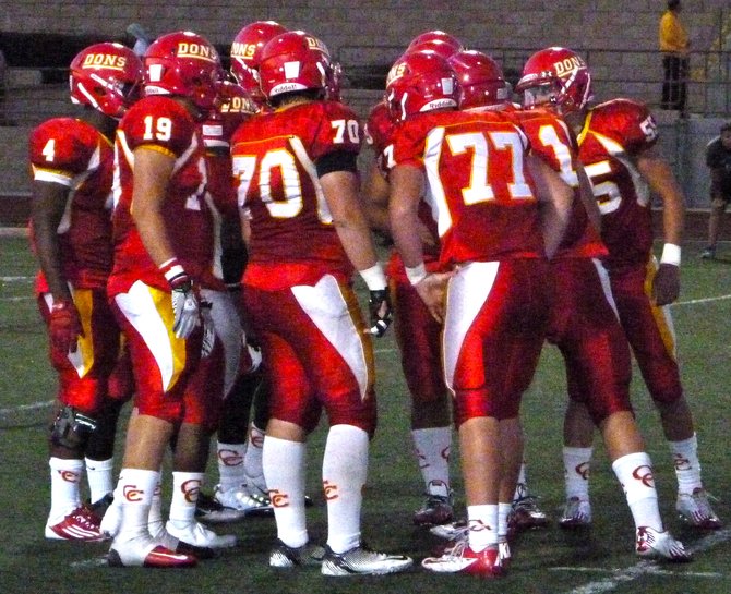 Cathedral Catholic in the offensive huddle
