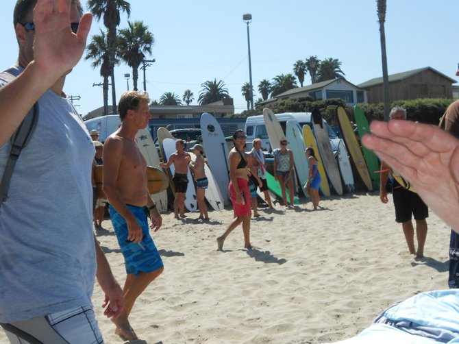 High fiving at the Paddle for Clean Water in Ocean Beach.