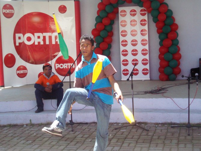 A juggler displays his abilities at the Christmas talent show at Casa de la Ninez orphanage in Quito, Ecuador