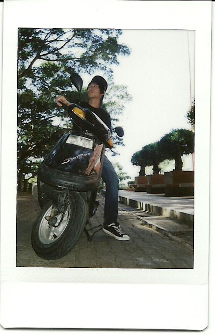 One of my favorite photos while traveling in Taiwan - the scooter I rode in Kaohsiung while studying at National Sun Yat Sen University. Taken with a poloroid camera.