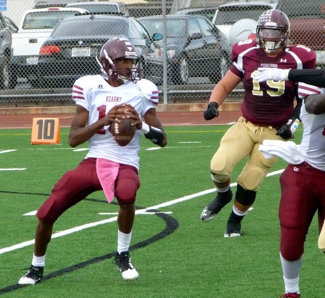 Kearny junior quarterback Stephen Pulley looks for a receiver downfield