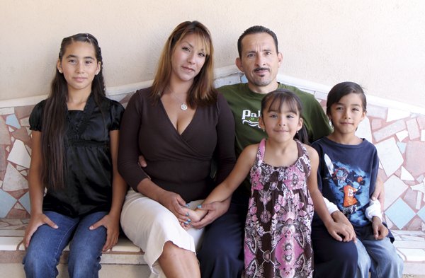 Frank and family. "At first, I was very angry. Now, I feel like I am in a better place with myself in Mexico."