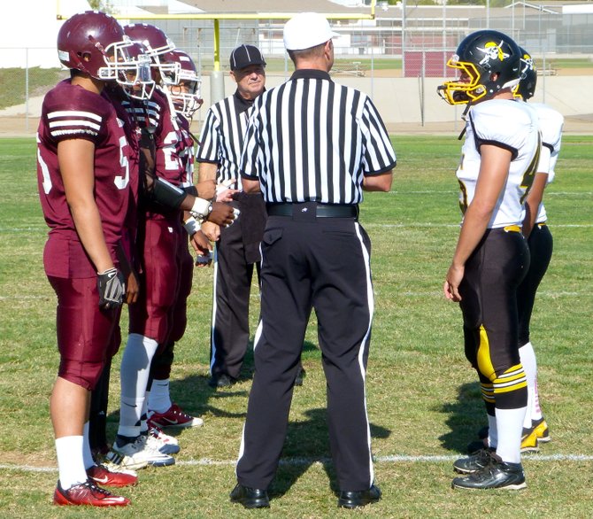 Kearny and Mission Bay team captains meet before the game for the coin toss